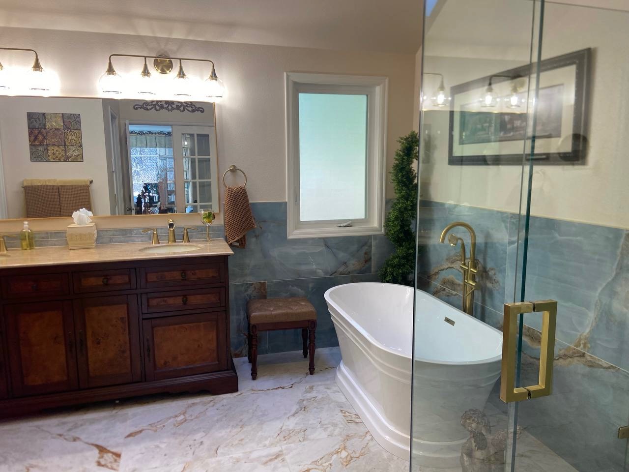 Double vanity with brass fixtures